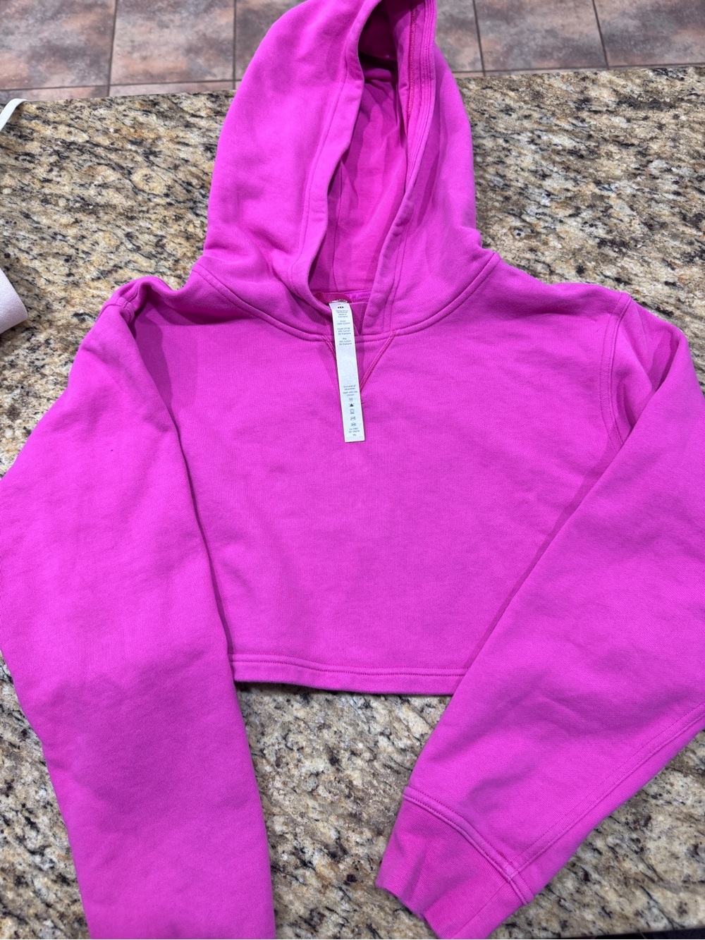 lululemon athletica  Cropped Hoodie in Bright Pink